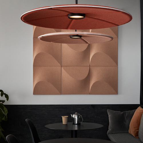 Abstracta Lily Acoustic Lamp and Sound Absorber with a dimmable LED light in the shape of lily water flowers - with lightning - white core - dark and light pink - side view - in office.