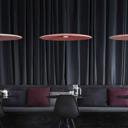 Abstracta Lily Acoustic Lamp and Sound Absorber with a dimmable LED light in the shape of lily water flowers - with lightning - white core - green - side view - in office.