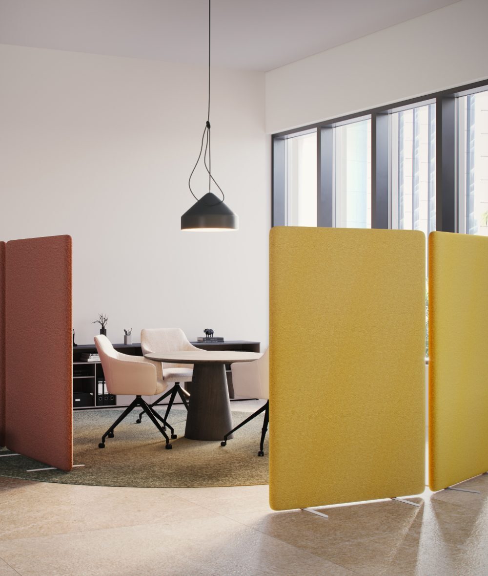 Freestanding acoustic floor screens creating a quiet meeting area
