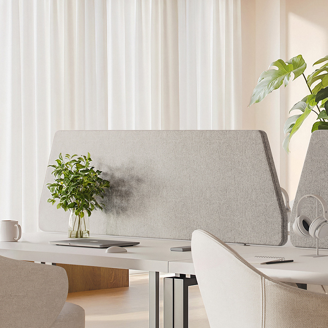 Delta 38 angled acoustic desk screens with tapered sides on office desks