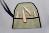 You are being shown the wood carving knife set in the heavy duty canvas tool roll. Some of them are in the pockets some are not.