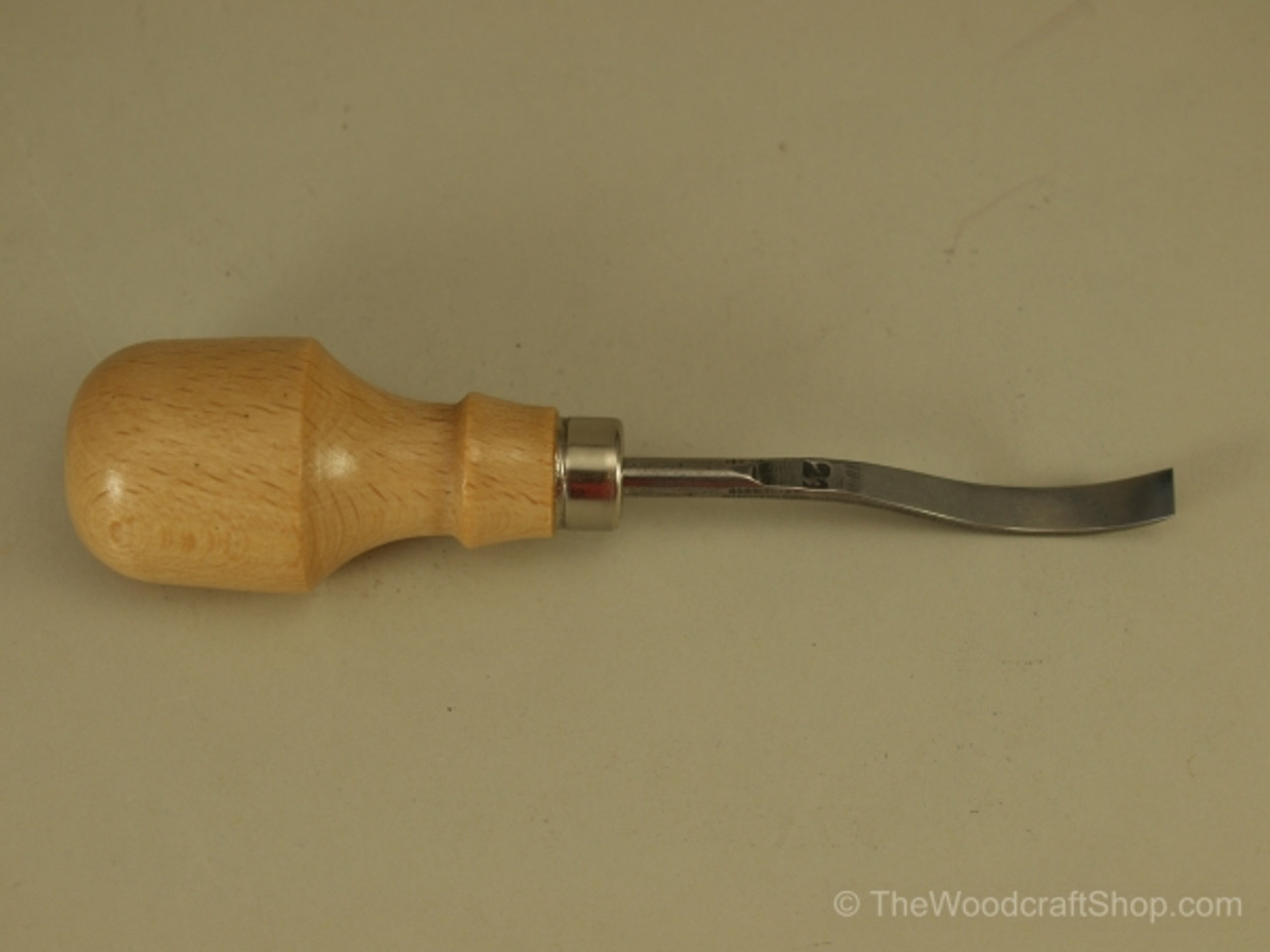 The image of the Stubai Palm #1 Short Bent Chisel 7mm is showing the beechwood handle and the blade.