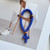 33 knots Cross-Shaped Komposkoini