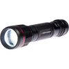High-resolution image of the Portwest PA75 USB rechargeable flashlight, black with a red accent ring. Highlights its compact design and powerful LED lens for adjustable focus.