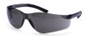 The PW38BKR is the smoke-tinted version of the Portwest Pan View series, specifically engineered for outdoor work environments and high-glare conditions. This image showcases the dark smoke polycarbonate lens, which reduces eye strain while providing a panoramic wrap-around view and 99% UV protection. Like its clear counterpart, this model features slim, lightweight side arms and metal-free hinges, making it durable and comfortable for long-term use. The sleek black-on-black aesthetic of the PW38BKR makes it a top choice for workers seeking professional, sports-style eye protection that meets ANSI Z87.1+ standards.
