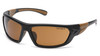 Carhartt Carbondale® Safety Glasses (CHB218D) featuring the Sandstone Bronze lens and the Black/Tan full frame. Highlights the co-injected rubber temples and nosepiece for non-slip comfort and secure fit. The Sandstone Bronze lens enhances contrast outdoors. Certified to ANSI Z87.1 and CSA Z94.3 standards for heavy-duty, high-impact protection.