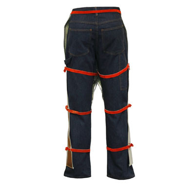 This image showcases the back of the Stanco AR505 High-Heat Chaps, highlighting the adjustable strap system designed for a custom, secure fit over work denim. The view emphasizes the open-back design, which is critical for maintaining airflow and preventing heat exhaustion in high-ambient-temperature environments like foundries and steel mills. Visible are the high-visibility red adjustment straps at the waist and across the thighs and calves, ensuring the aluminized P.B.I. protection remains perfectly positioned on the front of the legs to deflect radiant heat and molten splash.