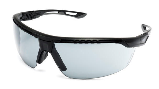 Close-up of Pyramex TruFlex Vented Safety Glasses, SBG11320DT model, featuring a Black and Gray frame with Gray H2X Anti-Fog Lens. Shows the half-frame design and adjustable nose piece. ANSI Z87.1 certified for high-impact.