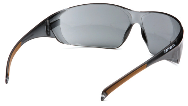 Rear 3/4 view of the Carhartt Billings® Safety Glasses (CH120ST). The image highlights the interior of the translucent gray frame/temple and the backside of the gray polycarbonate lens. Focus is placed on the comfortable brown rubber temple tips (TPR) designed for a non-slip, secure fit. The frame markings confirm compliance with ANSI Z87.1 and CSA Z94.3 high-impact standards.