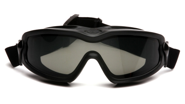 This direct front view of the Pyramex V2G-PLUS® GB6420SDT highlights the goggle's expansive 180° field of vision and its robust protection against environmental hazards. The image prominently displays the gray dual-pane Thermo Lens System, which utilizes an outer polycarbonate lens for high-impact protection and an inner acetate lens to permanently prevent fogging. You can also see the specialized indirect ventilation system integrated into the top and bottom of the black TPU frame. This design ensures consistent airflow and heat release while maintaining a D3 rating for protection against liquid droplets and chemical splashes.