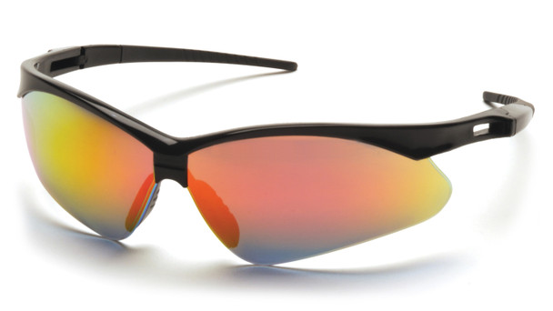 A vibrant 3/4 view of the Pyramex PMXTREME SB6345SP safety glasses, featuring a striking Ice Orange Mirror lens and a durable black nylon frame. The multi-colored mirrored coating not only provides a bold, sporty look but also significantly reduces glare and offers 99% protection against harmful UV rays in bright outdoor conditions. This model features the signature PMXTREME 10-base curve panoramic lens for maximum wraparound side protection and an expansive field of view. Ergonomic details include ventilated straight-back temples for consistent airflow and a built-in rubber nose piece for a secure, non-slip fit during physical activity. Certified to ANSI Z87.1-2020 standards and weighing only 23.1 grams, these glasses include an adjustable black lanyard cord to prevent loss or damage on the job.