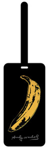 A black rectangular luggage tag with an image of a yellow banana