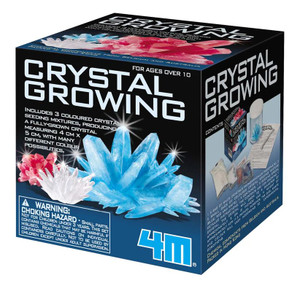 This image has a black background with three grown crystals pictured.