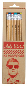 A tan cardboard box of pencils with red text and a portrait of Andy Warhol wearing sunglasses A tan cardboard box of pencils with red text and a portrait of Andy Warhol wearing sunglasses