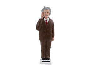 This image shows a figurine of Einstein in a brown suit tapping  his finger to his brain.