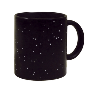 This image shows a black mug with stars on it. Pour a hot beverage in the mug and watch the constellations appear. This image shows a black mug with stars on it. Pour a hot beverage in the mug and watch the constellations appear.