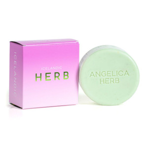 Box of with round herbal soap bar.