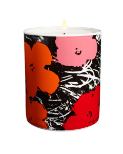 A porcelain candle holder with pink red and orange flowers on a black and white background A porcelain candle holder with pink red and orange flowers on a black and white background