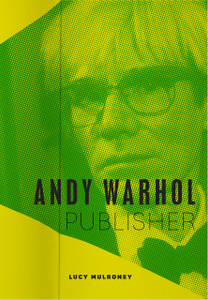 image of a book cover with a photo of a man wearing glasses. image of a book cover with a photo of a man wearing glasses.