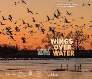 Image of the cover of Wings Over Water, which shows the silhouettes of a flock of sandhill cranes against an orange sunset sky Image of the cover of Wings Over Water, which shows the silhouettes of a flock of sandhill cranes against an orange sunset sky