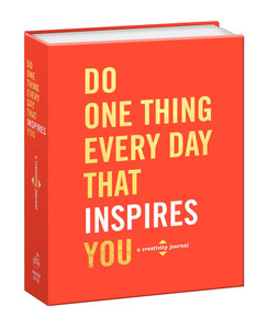 An orange book with gold foil lettering. An orange book with gold foil lettering.