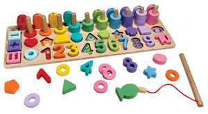 Wooden board with colorful fish, shapes, and numbers strewn about.  Some shapes or number blocks out of place revealing animals or fruits underneath. Wooden board with colorful fish, shapes, and numbers strewn about.  Some shapes or number blocks out of place revealing animals or fruits underneath.