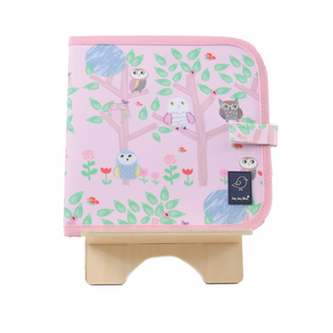 Front cover of book.  Light pink featuring multiple owls sitting in trees. Front cover of book.  Light pink featuring multiple owls sitting in trees.
