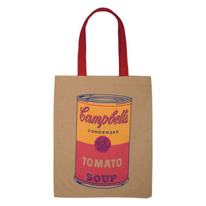 A tan canvas tote bag with red handles silkscreened with a yellow and red Campbell's Soup can.