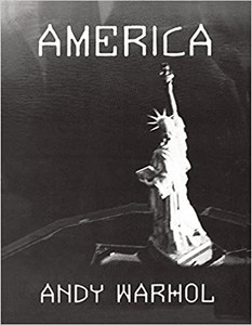 A book cover with a black and white photograph of the Statue of Liberty from above and the title "America" A book cover with a black and white photograph of the Statue of Liberty from above and the title "America"