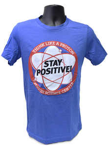 This image is a medium blue heather tee with a red circle in the middle of the front side.Inside the circle is a white and red graphic of a proton with the words stay positive in black letters. Our logo is located on the bottom of the circle.
