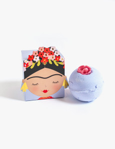 Periwinkle box featuring Frida Kahlo illustration next to periwinkle bath balm with rose at the top. Periwinkle box featuring Frida Kahlo illustration next to periwinkle bath balm with rose at the top.
