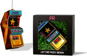 Arcade ornament placed next to it's gift packaging. Arcade ornament placed next to it's gift packaging.