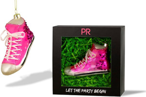 Pink high top ornament placed next to it's gift box. Pink high top ornament placed next to it's gift box.