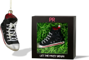 Black high top ornament placed next to it's gift box. Black high top ornament placed next to it's gift box.