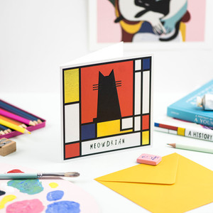 Colorful grid in the style of Piet Mondrian featuring silhouette of cat. Colorful grid in the style of Piet Mondrian featuring silhouette of cat.