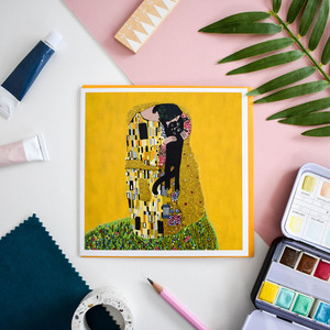 Gold card featuring person kissing black cat, reminiscent of Gustav Klimt's The Kiss. Gold card featuring person kissing black cat, reminiscent of Gustav Klimt's The Kiss.