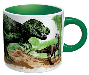 White mug with green handle fleshed out dinosaur.