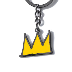Close up of the yellow enamel crown keychain. Close up of the yellow enamel crown keychain.
