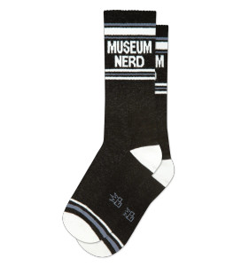Black and white crew socks, text in white"museum nerd". Black and white crew socks, text in white"museum nerd".