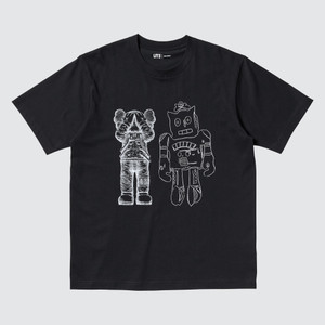 Black tee, front view, KAWS Space companion with a Warhol Robot illustration. Black tee, front view, KAWS Space companion with a Warhol Robot illustration.