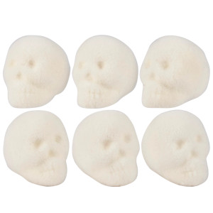 Six cream color flocked skull heads. Six cream color flocked skull heads.