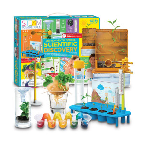 A blue boxed science kit with its experimental contents arrayed in front of it. A blue boxed science kit with its experimental contents arrayed in front of it.