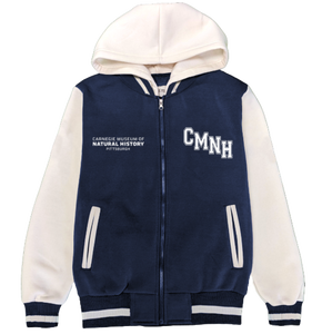 Jacket has navy body with white sleeves and hood. Jacket body has "CMNH" printed on the left side and "Carnegie Museum of Natural History Pittsburgh" printed on right.