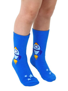 A pair of blew crew socks with rockets on the calves being worn