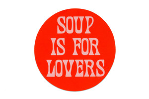 Red circular sticker, text in white "soup is for lovers". Red circular sticker, text in white "soup is for lovers".