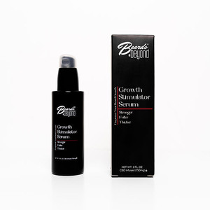 the bottle and outer packaging. the bottle is black with a pump and a clear plastic cap. the outer packaging is also black with the logo "beards & Beyond" across the top written in white and the item name written in white across the middle