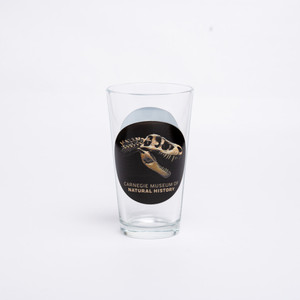 glass itself is clear with a photograph of the T. Rex skull and the museum name underneath with a black circle behind. glass itself is clear with a photograph of the T. Rex skull and the museum name underneath with a black circle behind.