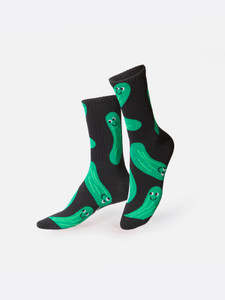 a pair of black socks with images of green pickles with a smiley face. a pair of black socks with images of green pickles with a smiley face.