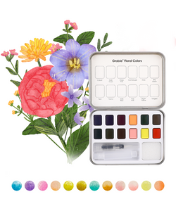 Open box of the watercolor displayed on a background watercolor image. Open box of the watercolor displayed on a background watercolor image.