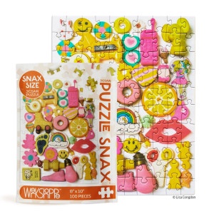 The package displayed next to a completed puzzle. The package displayed next to a completed puzzle.